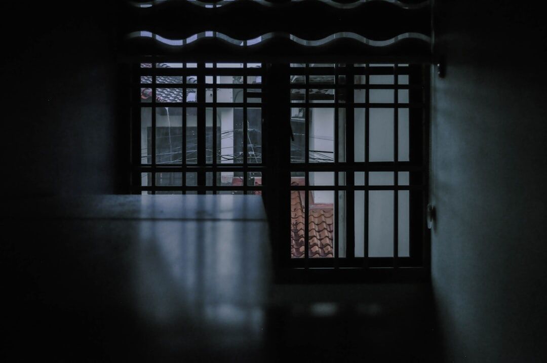 security guard flashlight dark room